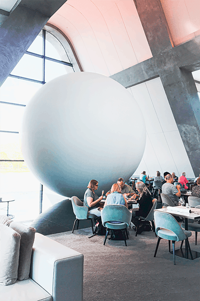 image shows a spherical art installation located in a rastaurant. The image was taken at MONA Tasmania.
