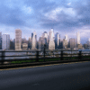 Image shows the New York City skyscape under a clody sky.