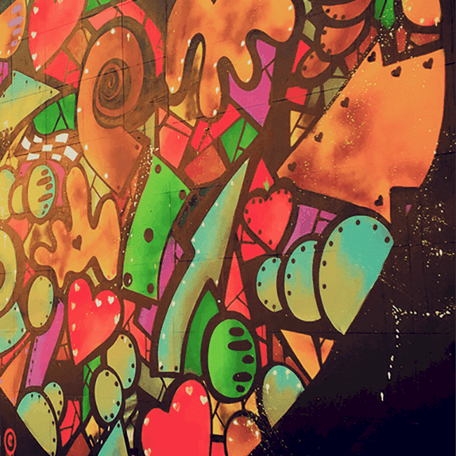 Image shows a brightly coloured graffiti heart above the text "Plus Size Travel Resources"